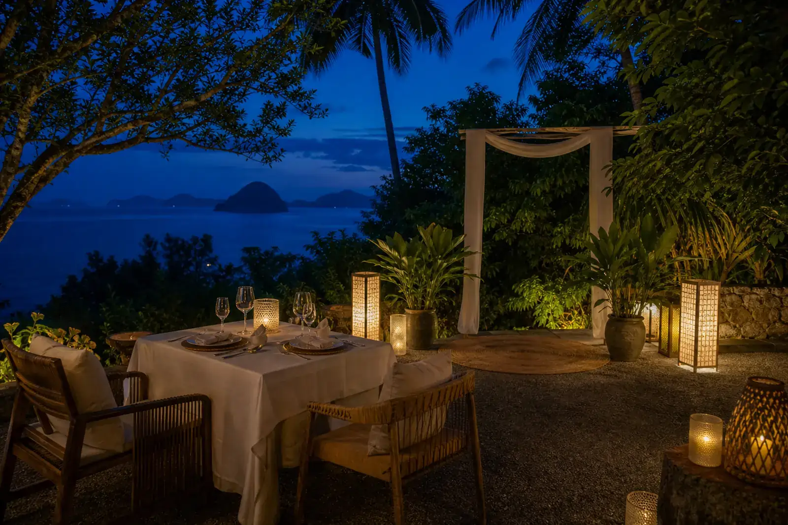  anniversary dinner and vow-renewal setting on a fictional Palawan terrace
